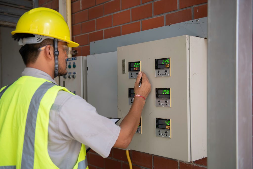 electrician working on an electrical supply board